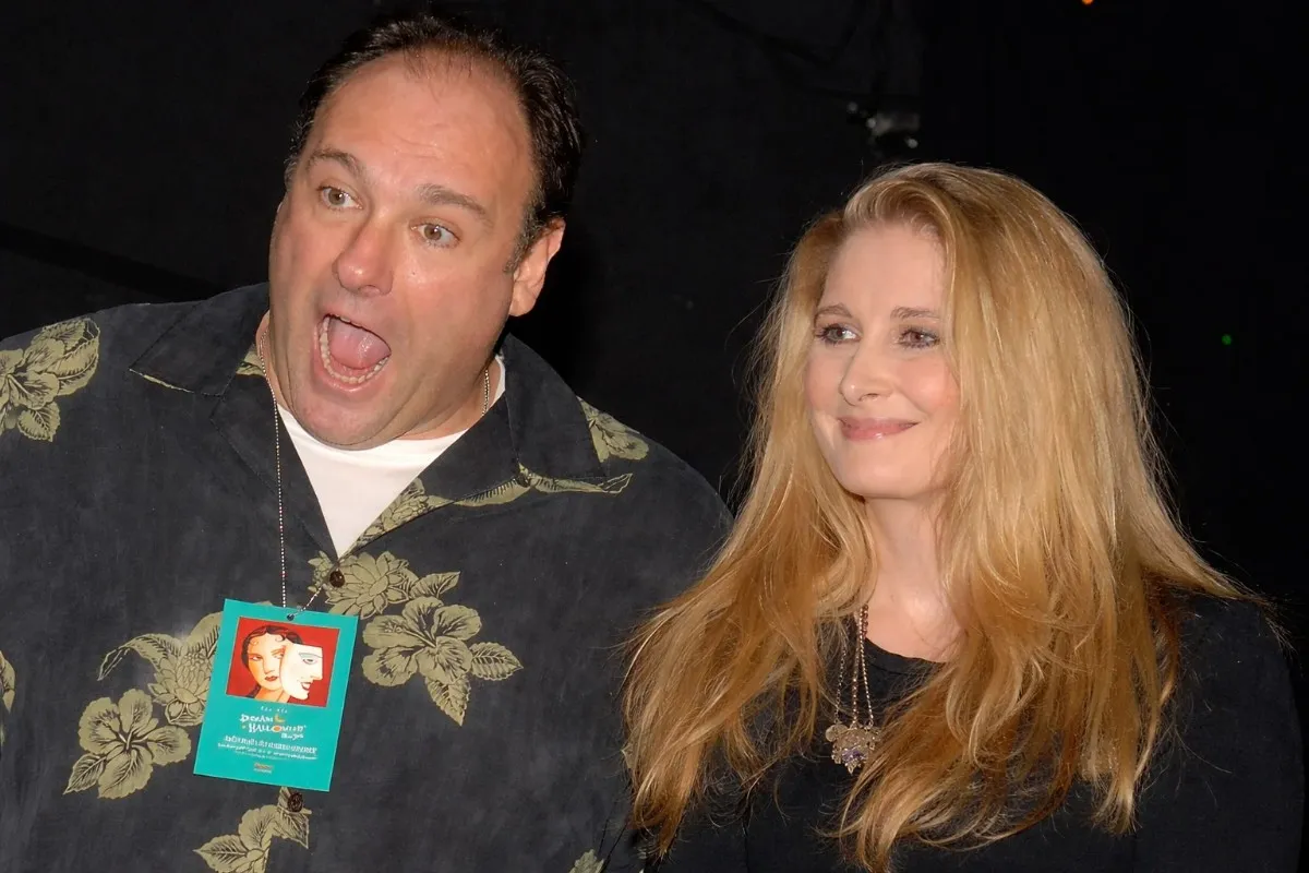 Marcy Wudarski smiling beside a man making a playful expression at a casual Hollywood event.