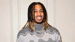 Celebrity-inspired portrait with modern fashion styling and accessories for DDG Net Worth related entertainment and lifestyle content.