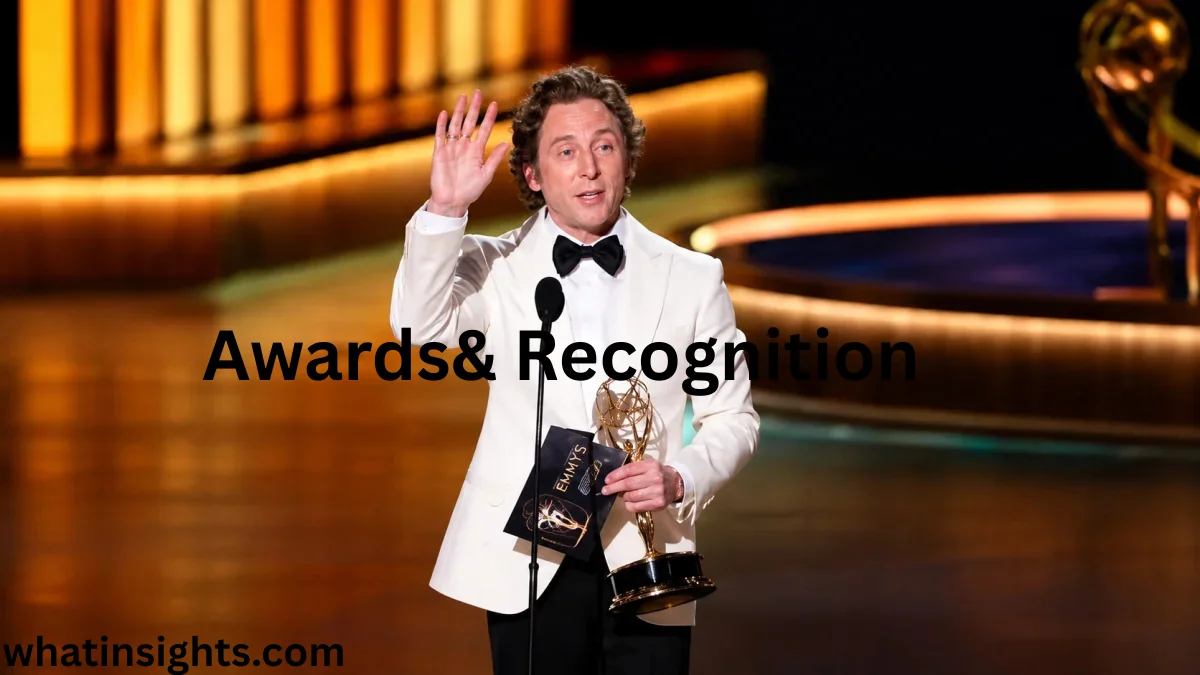 Jeremy Allen White holding an Emmy award during a live speech ceremony highlighting Jeremy Allen White Net Worth and his successful Hollywood acting career.