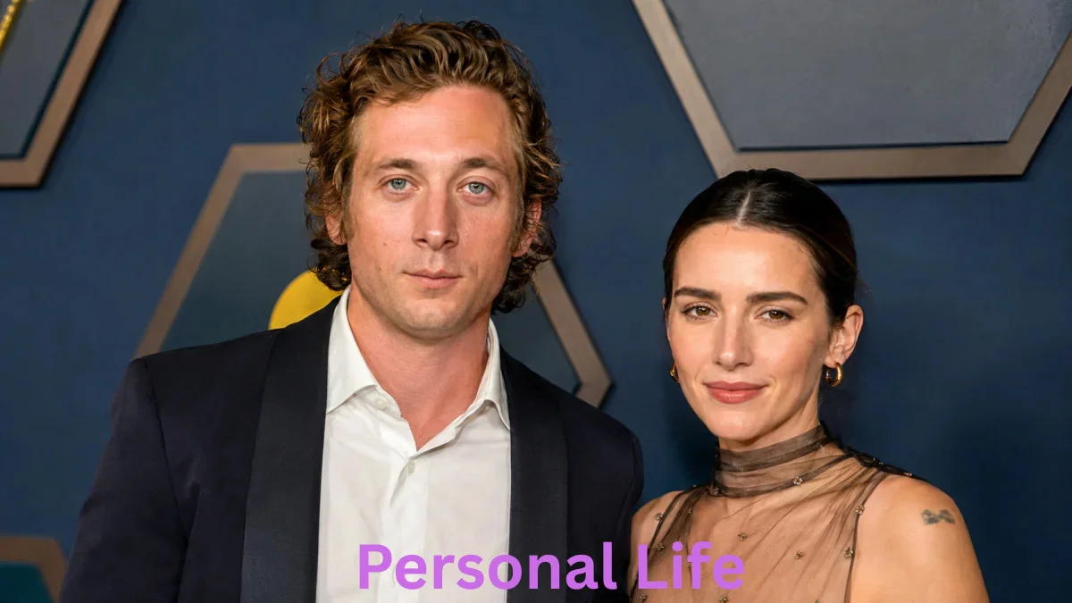 Jeremy Allen White Net Worth image showing Jeremy Allen White and his partner posing together at a formal red carpet event in stylish attire.
