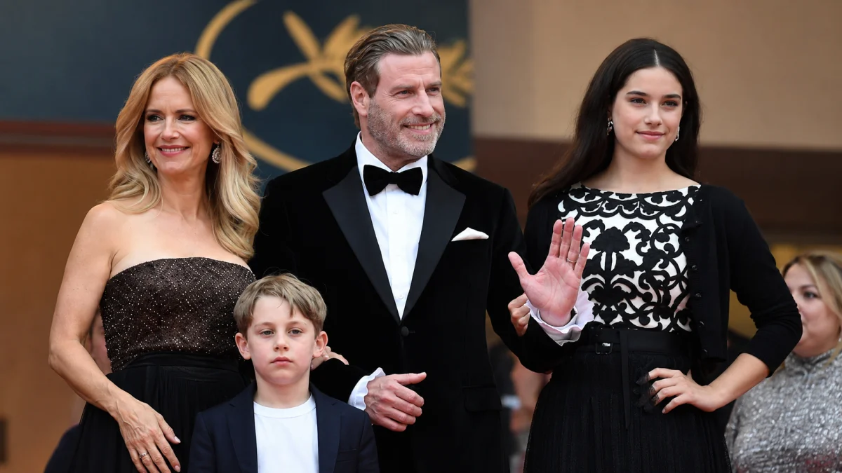 John Travolta posing with his family at a Cannes red carpet event – john travolta celebrity family appearance image
