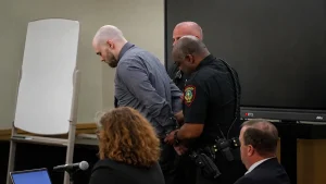 Convicted murderer Tanner Horner is handcuffed by law enforcement officers in a Fort Worth courtroom on May 5, 2026, following his death sentence for the 2022 killing of Athena Strand.