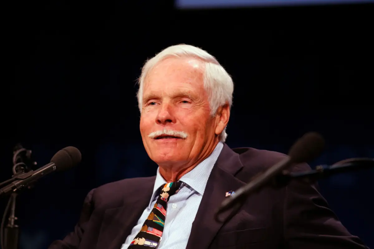 A portrait of media pioneer Ted Turner, the visionary founder of CNN and the UN Foundation, who passed away on May 6, 2026, leaving a historic impact on global journalism.