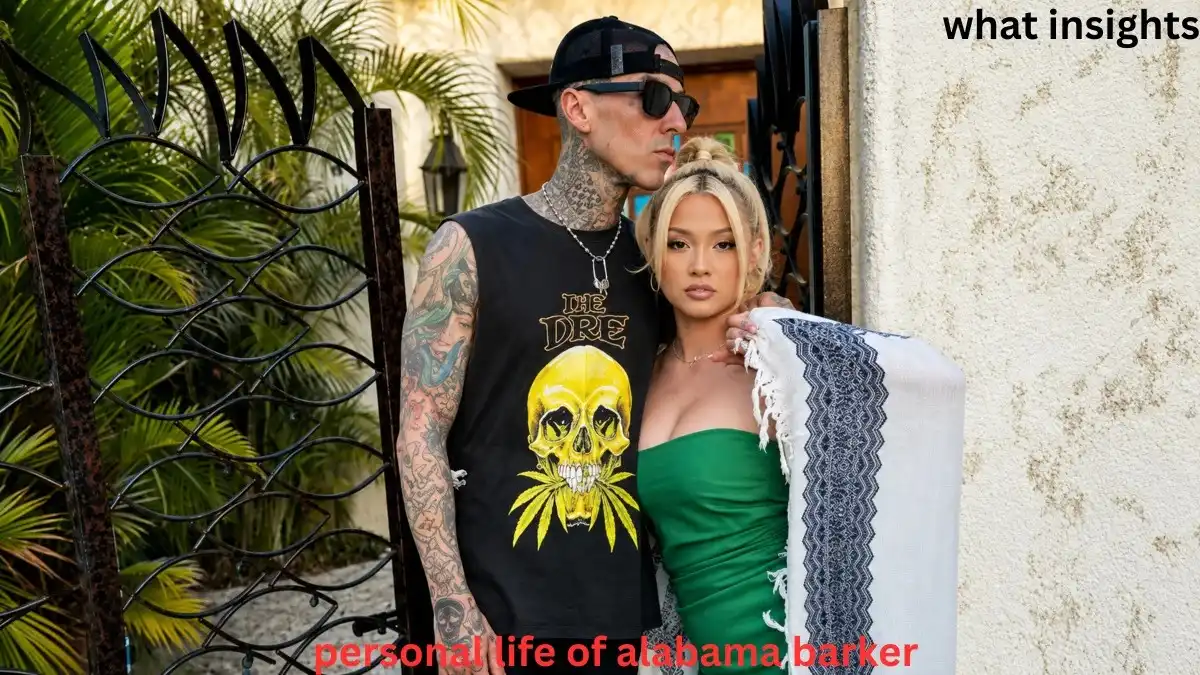 Alabama Barker Net Worth personal life image showing Alabama Barker standing with a tattooed man outdoors, capturing a casual family lifestyle moment and celebrity relationship appearance.