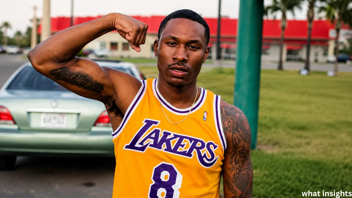 Duke Dennis flexing in a Lakers jersey outdoors representing Duke Dennis Net Worth lifestyle and success