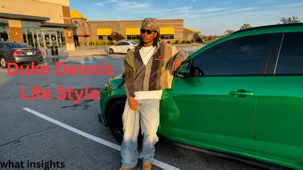 Duke Dennis posing beside a green luxury car showing premium lifestyle related to Duke Dennis Net Worth and success