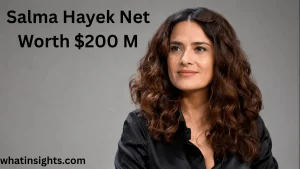 Studio portrait of actress Salma Hayek wearing a black silk blouse, featuring text highlighting Salma Hayek Net Worth as an illustration of her financial and career milestones.