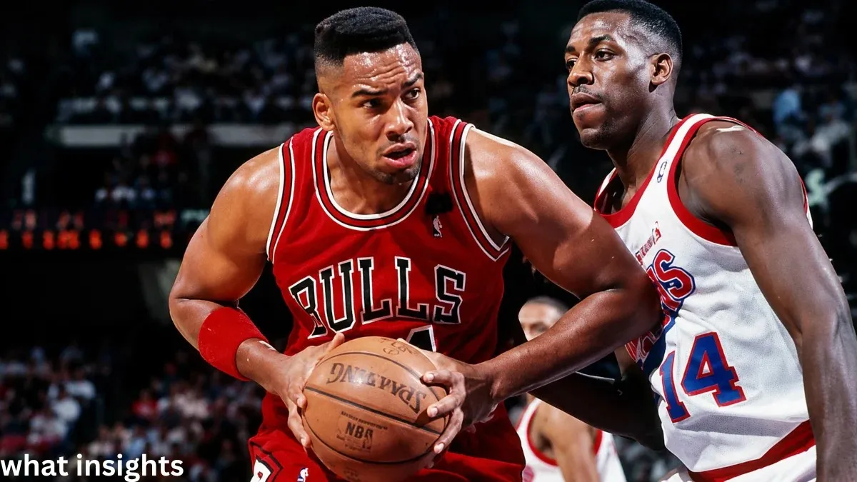 Chicago Bulls basketball action moment with player holding the ball under pressure from defender, representing stacey king during an NBA game highlight scene.