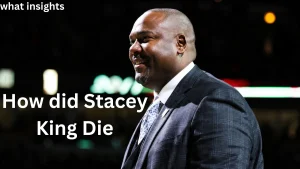 Portrait of former Chicago Bulls player and broadcaster stacey king smiling during an NBA arena event, representing his legacy with the Chicago Bulls.